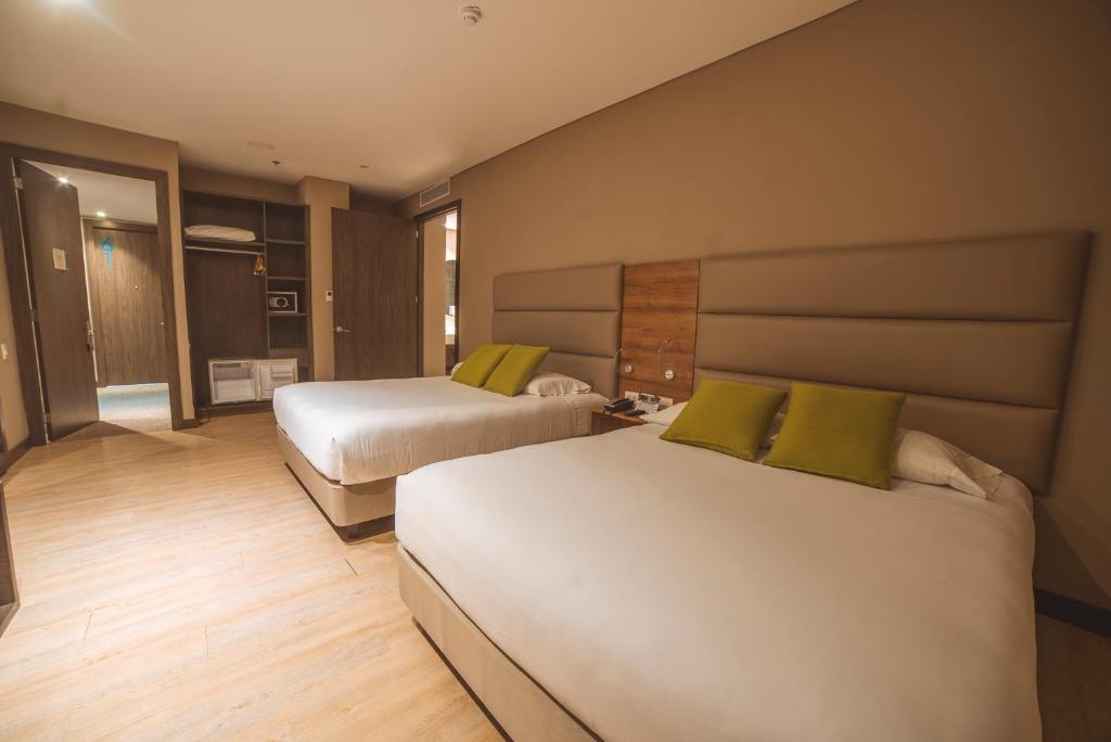 Postel nebo postele na pokoji v ubytování Hotel F25