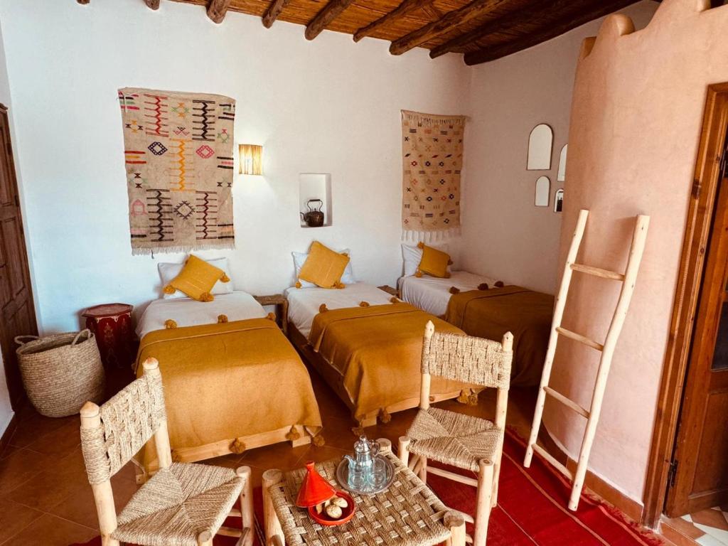 Postel nebo postele na pokoji v ubytování Riad Eucalyptus, Ethnic Hotel