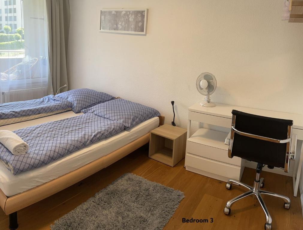 Postel nebo postele na pokoji v ubytování EnjoyLucerne