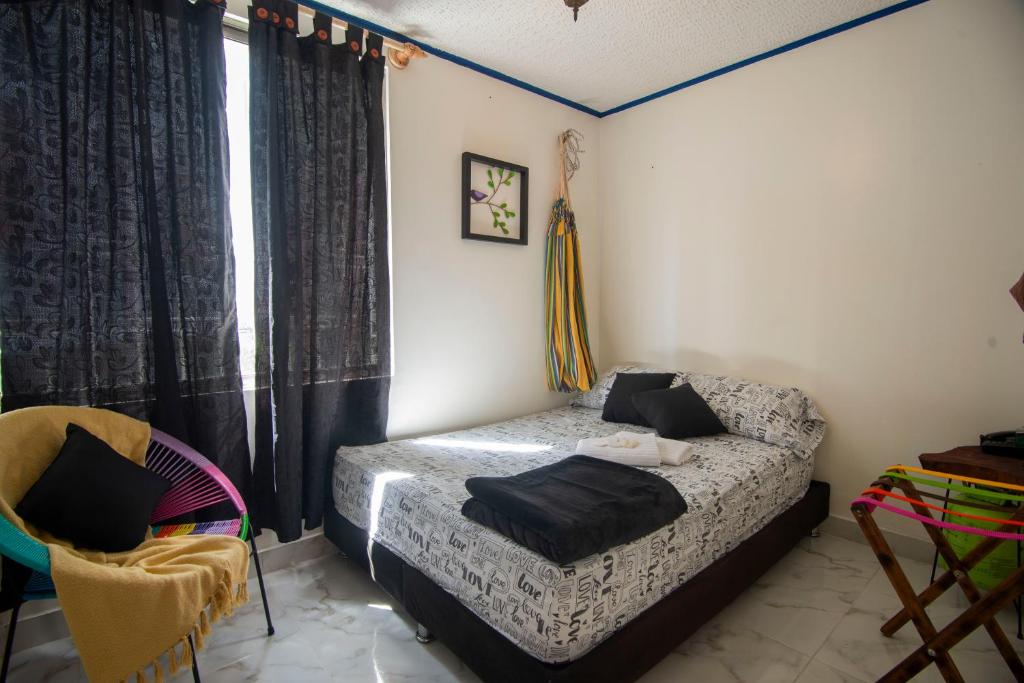 Postel nebo postele na pokoji v ubytování Antigua Hostal