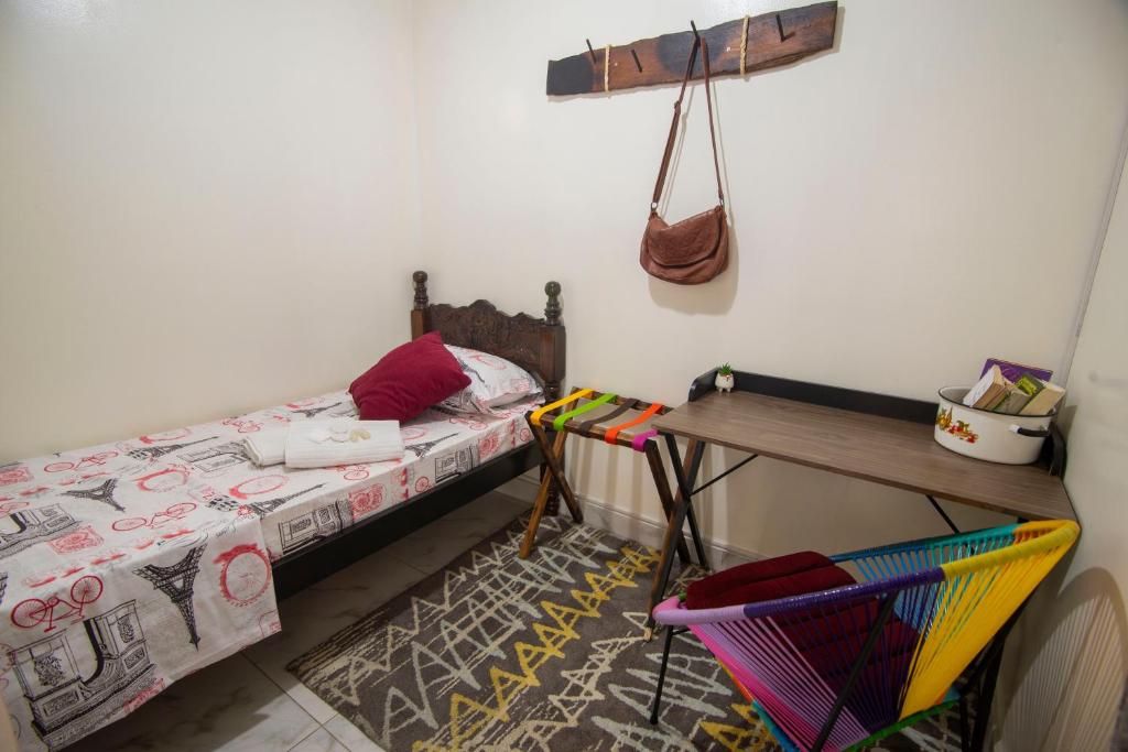 Postel nebo postele na pokoji v ubytování Antigua Hostal