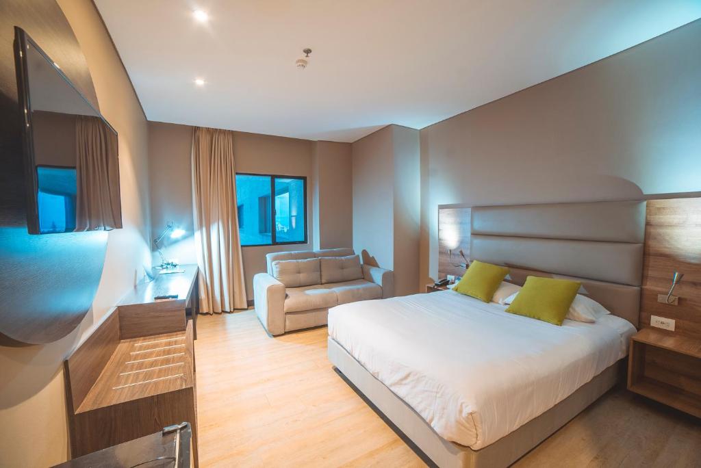 Postel nebo postele na pokoji v ubytování Hotel F25