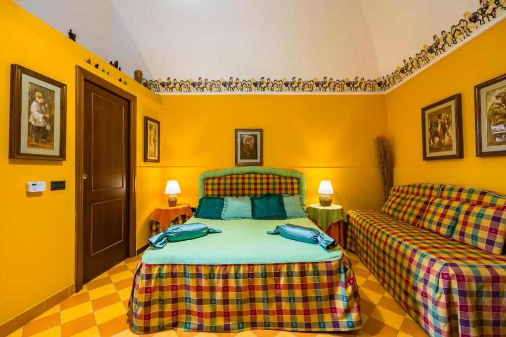 Postel nebo postele na pokoji v ubytování Orchid Corner Guesthouse