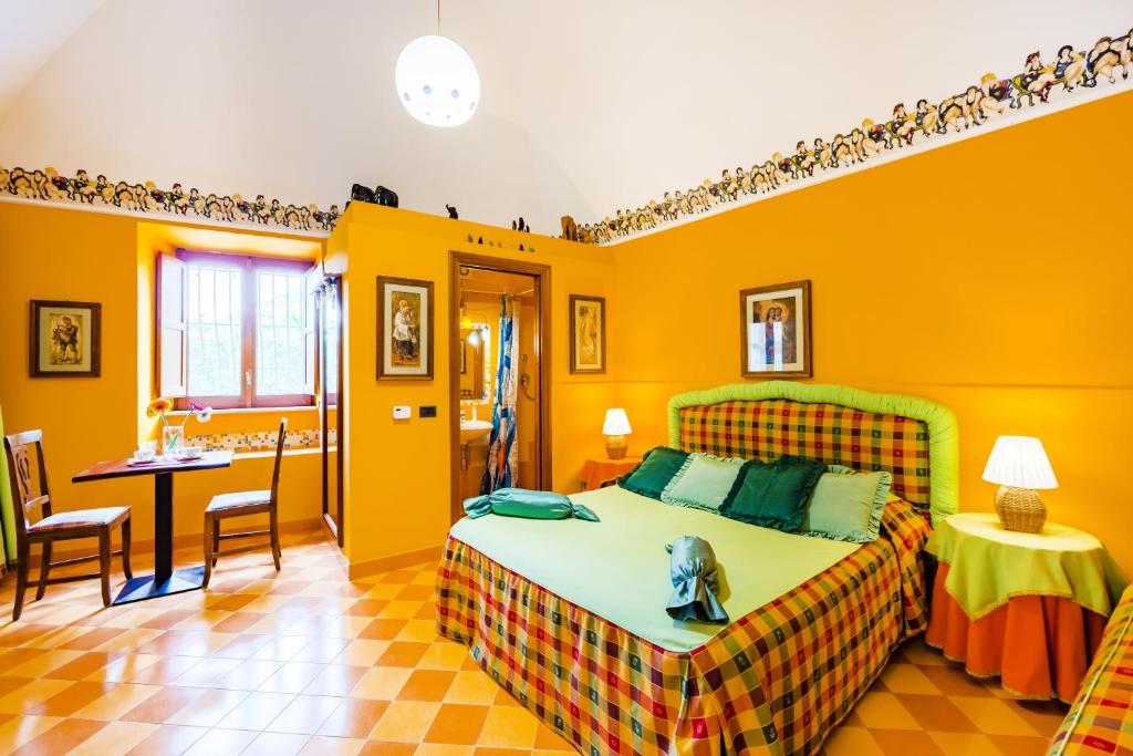Postel nebo postele na pokoji v ubytování Orchid Corner Guesthouse