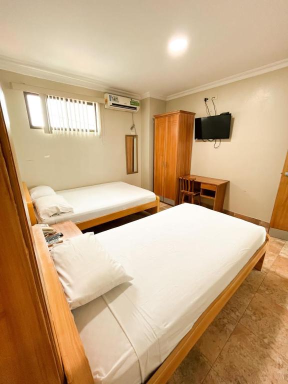 Postel nebo postele na pokoji v ubytování HOTEL MARLUZ