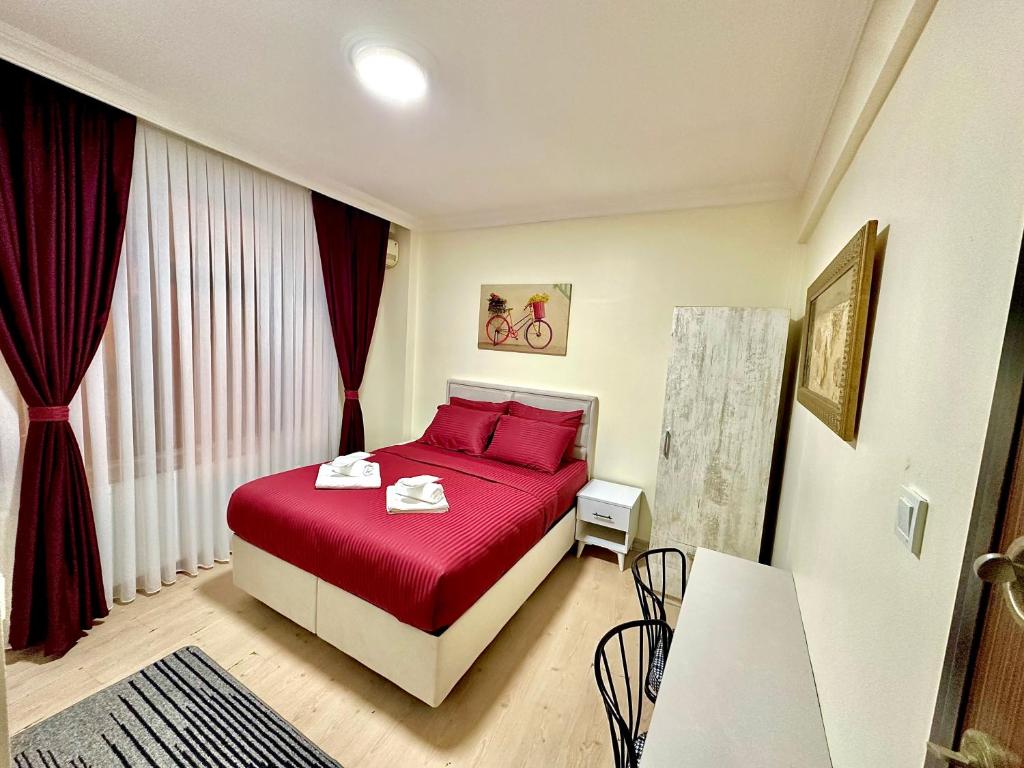 Postel nebo postele na pokoji v ubytování Golden Kent Apart Hotel Taksim
