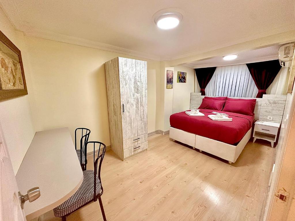 Postel nebo postele na pokoji v ubytování Golden Kent Apart Hotel Taksim