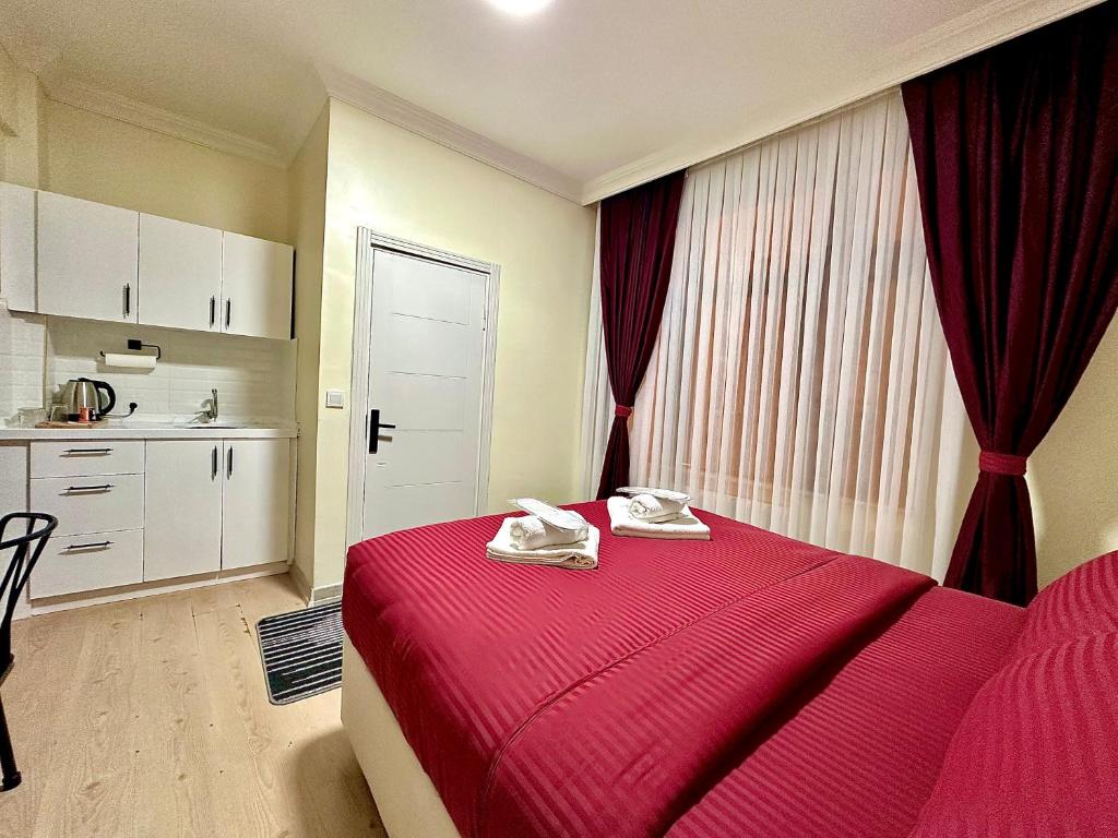 Postel nebo postele na pokoji v ubytování Golden Kent Apart Hotel Taksim