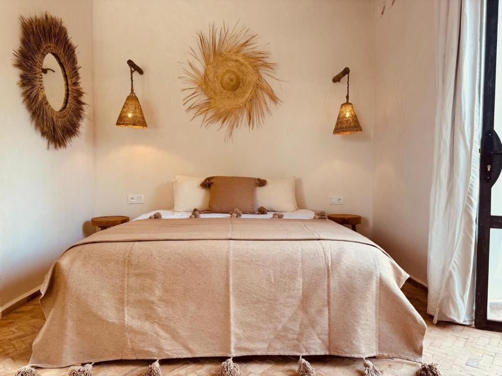 Postel nebo postele na pokoji v ubytování Riad Eucalyptus, Ethnic Hotel