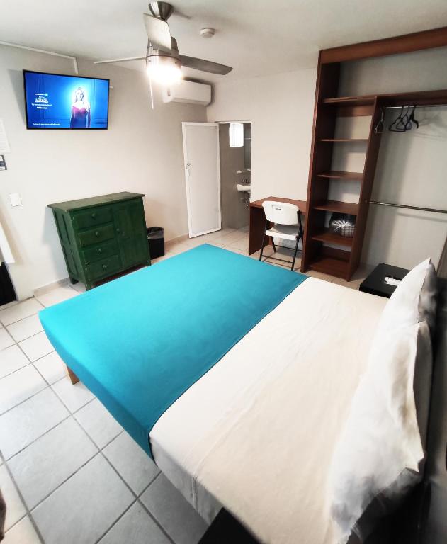 Postel nebo postele na pokoji v ubytování Hotel del Refugio