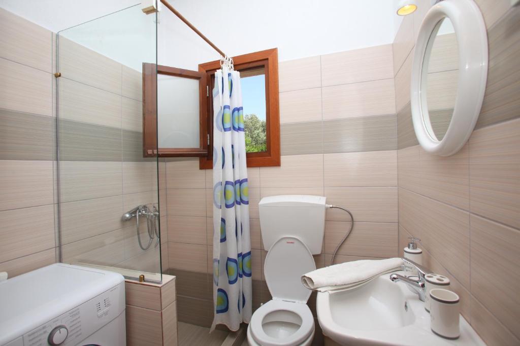 Koupelna v ubytování Giasemi Apartments