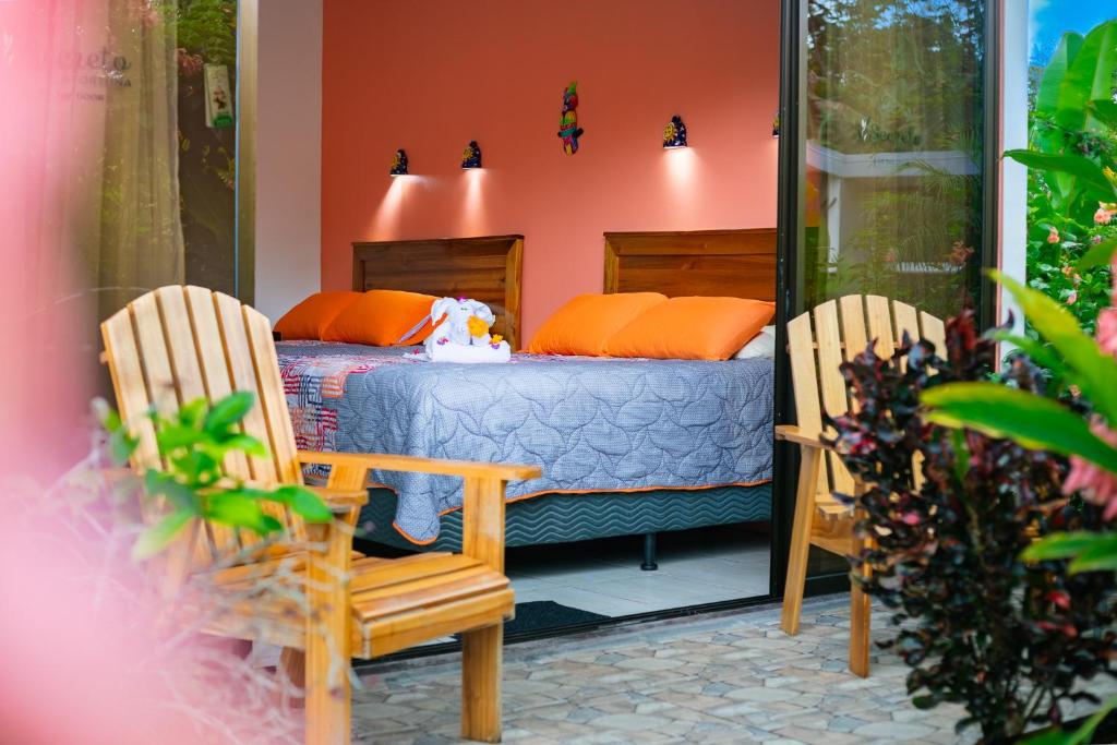 Postel nebo postele na pokoji v ubytování Hotel Secreto La Fortuna