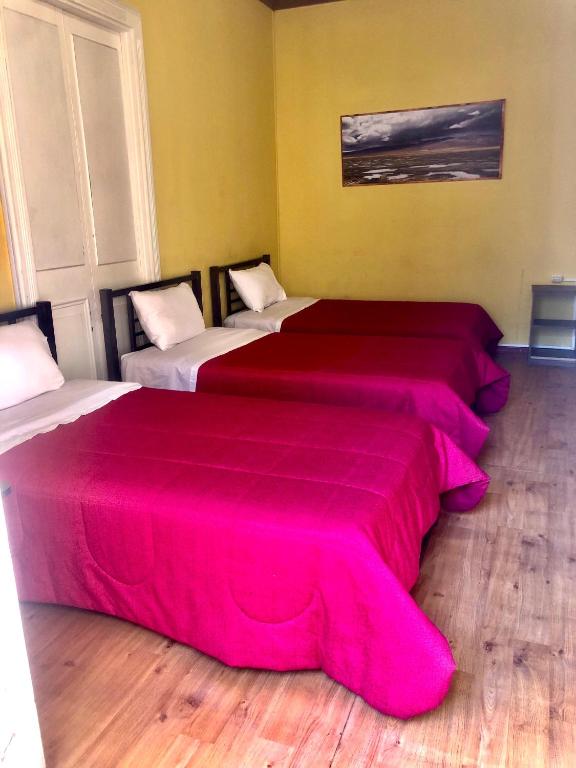 Postel nebo postele na pokoji v ubytování Holidays Hostel Arequipa