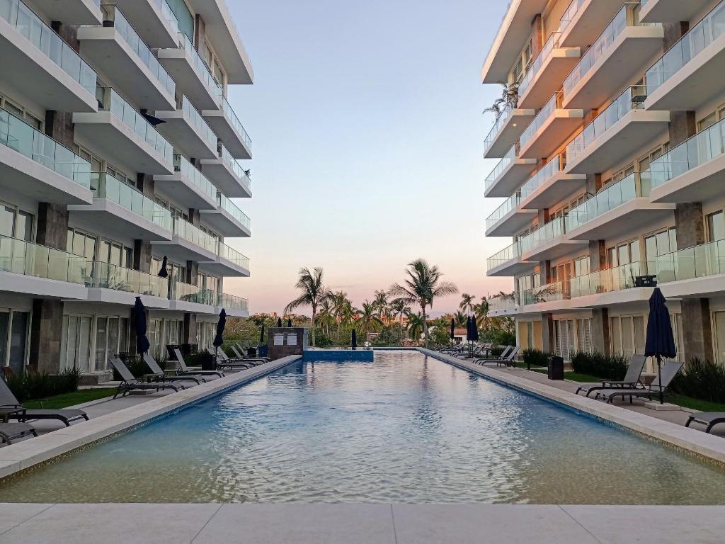 La alberca dentro o cerca de Refugio marino, alberca y playa