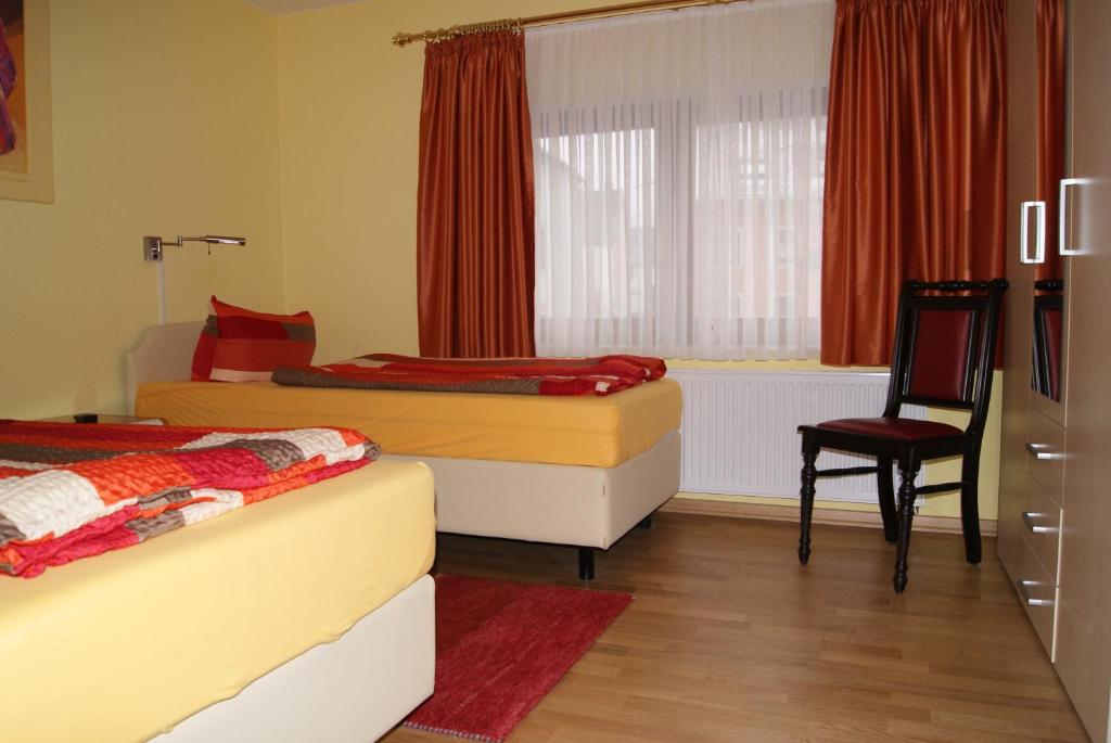 Postel nebo postele na pokoji v ubytování Hotel Kugel
