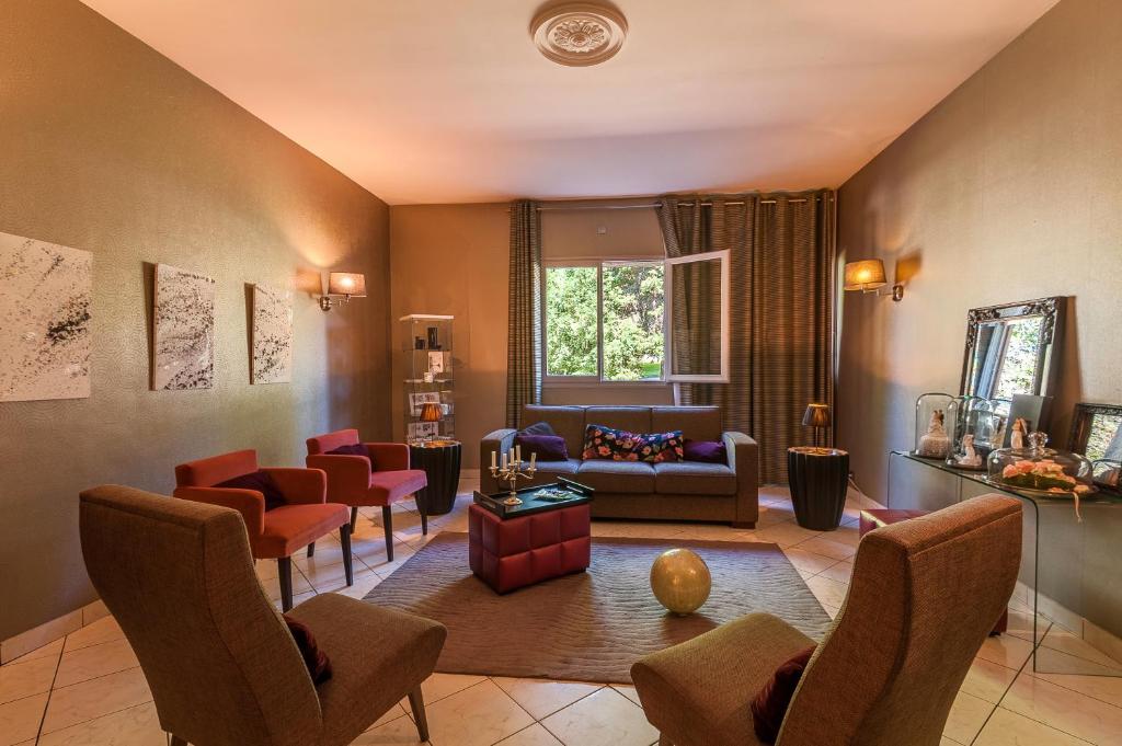 Posezení v ubytování Logis Hotel - Restaurant Le Relais de Comodoliac