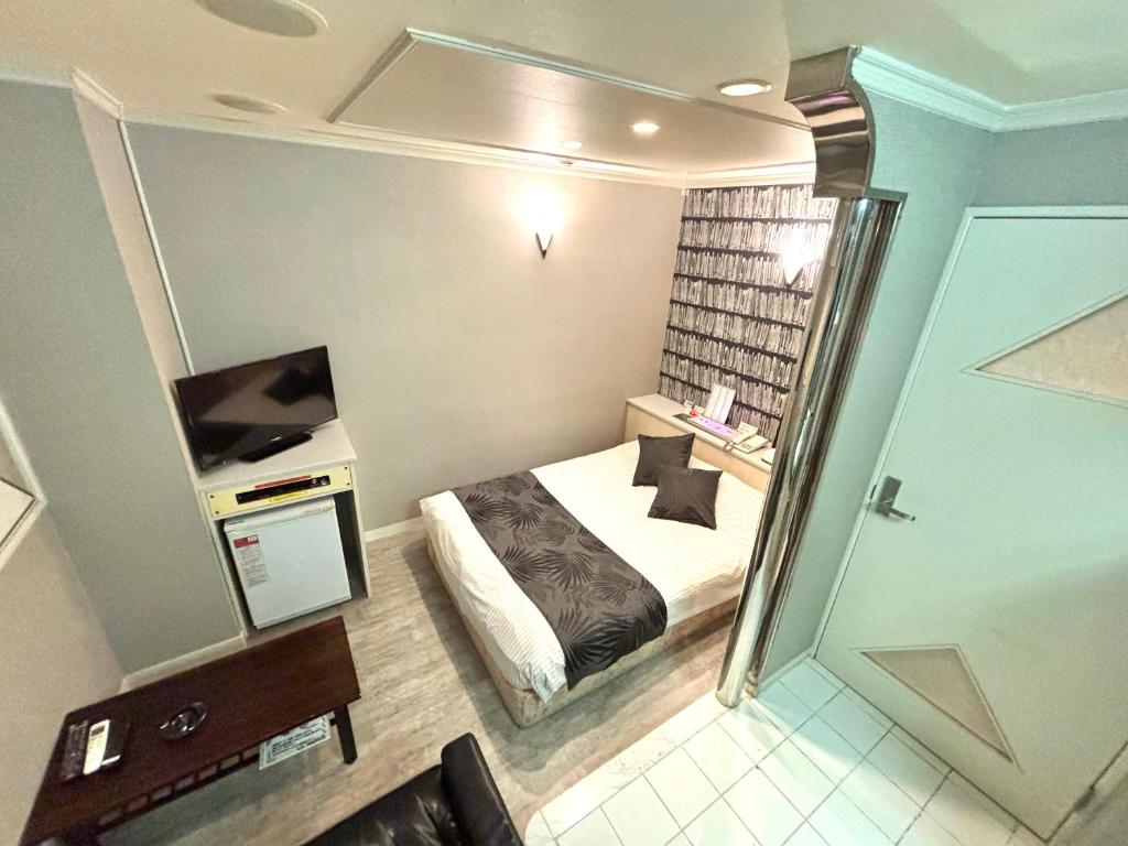 Postel nebo postele na pokoji v ubytování Hotel PRINCESS2 -adult only-