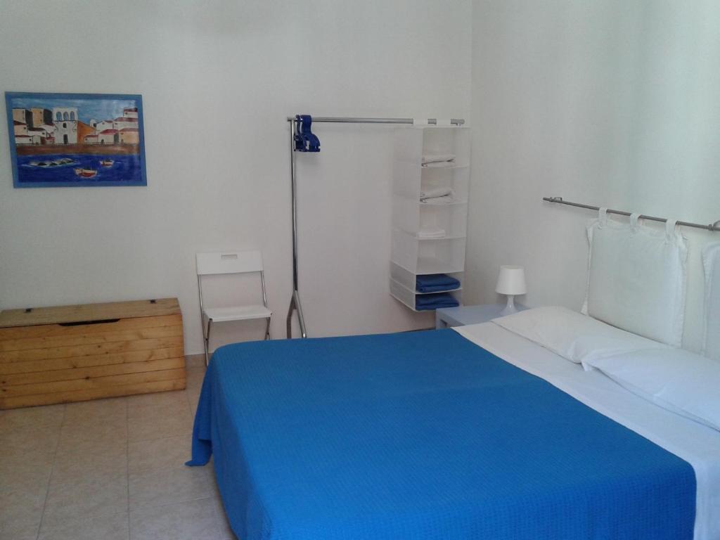 Posteľ alebo postele v izbe v ubytovaní B&B CARAVAGGIO SIRACUSA 200 Metres from Ortigia