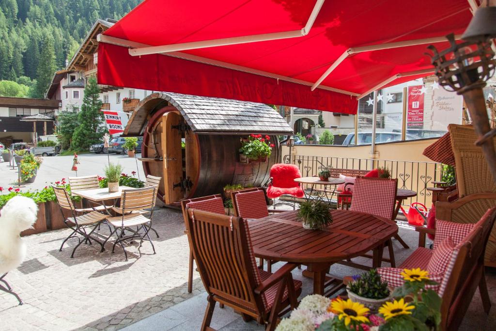 Reštaurácia alebo iné gastronomické zariadenie v ubytovaní Am Dorfplatz Suites - Adults only