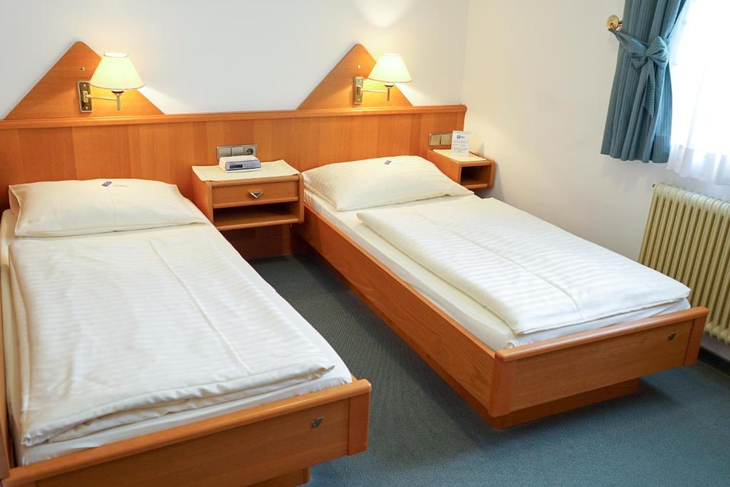 Postel nebo postele na pokoji v ubytování Pension Besser