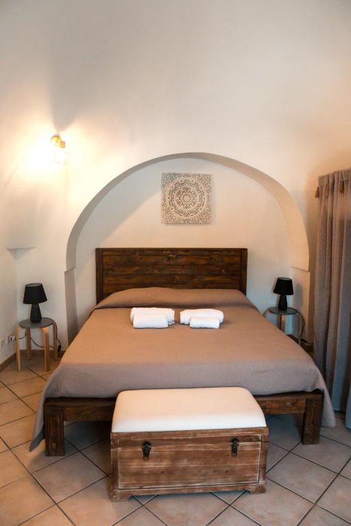 Postel nebo postele na pokoji v ubytování Trulli Mamima