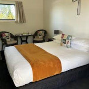 Postel nebo postele na pokoji v ubytování Buller Bridge Motel