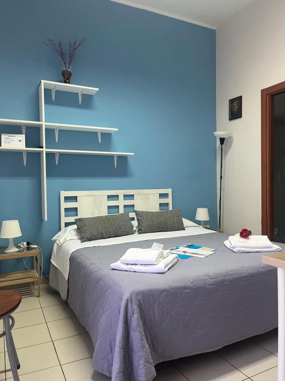 Postel nebo postele na pokoji v ubytování Agorà sulla via dei Templi