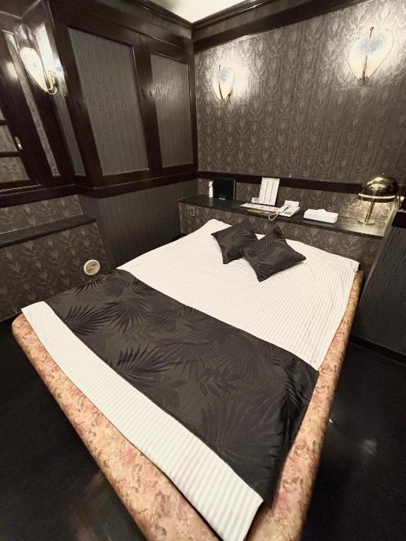 Postel nebo postele na pokoji v ubytování Hotel PRINCESS2 -adult only-