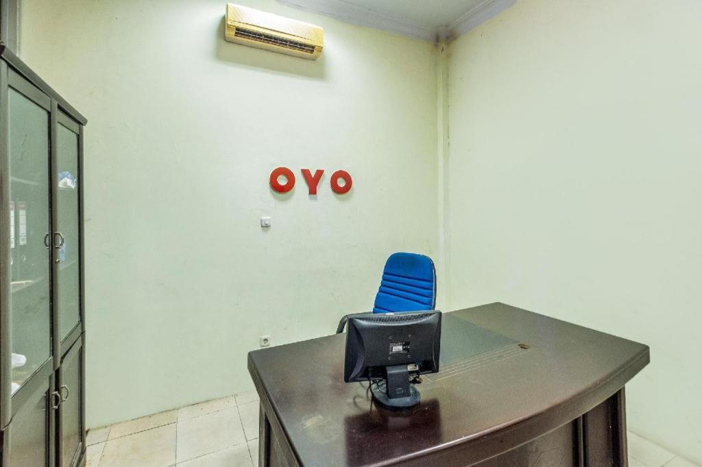 Fotografie z fotogalerie ubytování OYO 1906 Zhafira Guest House Syariah v destinaci Sungguminasa