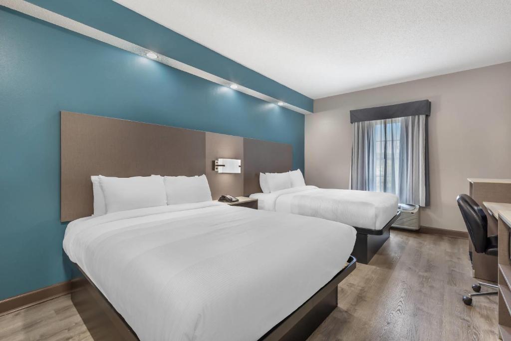 Postel nebo postele na pokoji v ubytování Quality Inn Wilmington
