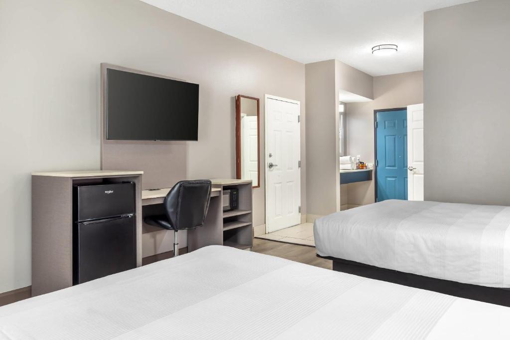 Postel nebo postele na pokoji v ubytování Quality Inn Wilmington