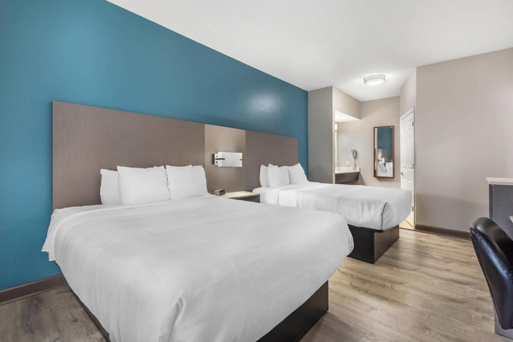 Postel nebo postele na pokoji v ubytování Quality Inn Wilmington