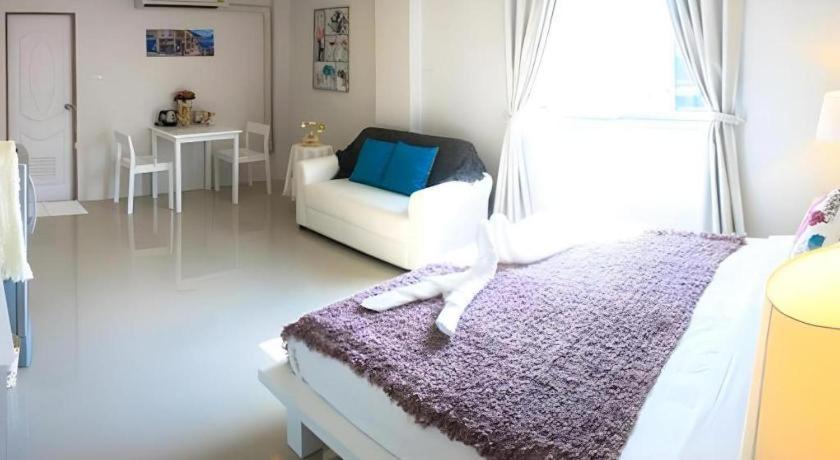 Chic Hotel Suratthaniにあるベッド