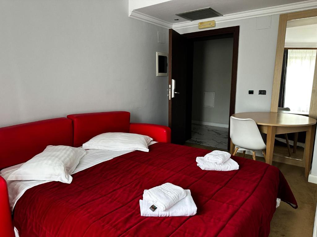 Postel nebo postele na pokoji v ubytování Grand Master Hotel