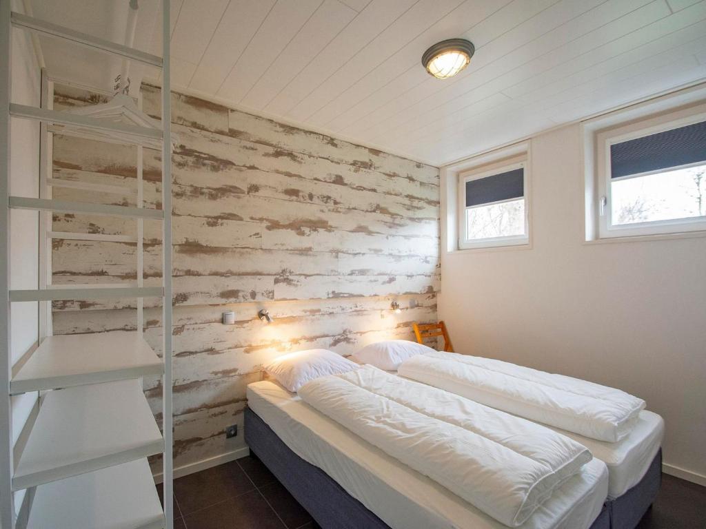 Postel nebo postele na pokoji v ubytování Beachside holiday home