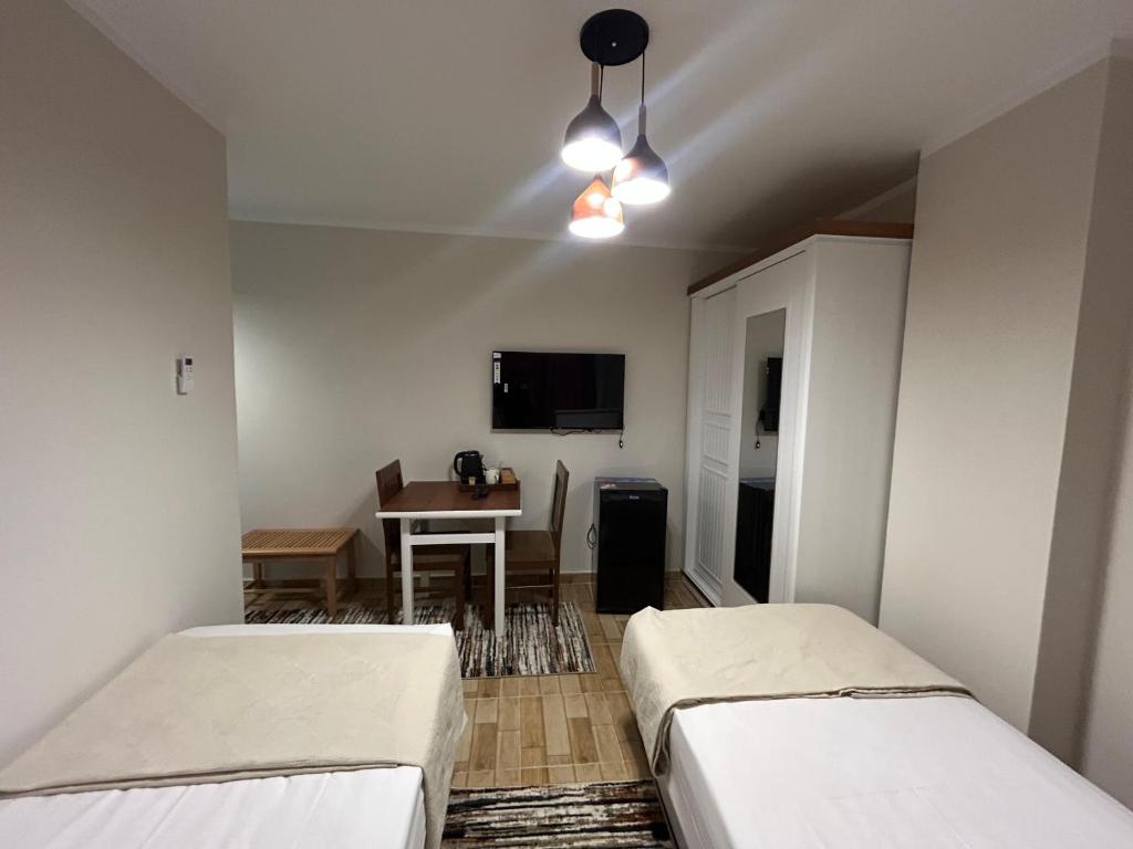 Postel nebo postele na pokoji v ubytování Stayline hotel apartments 5 mins from Cairo airport
