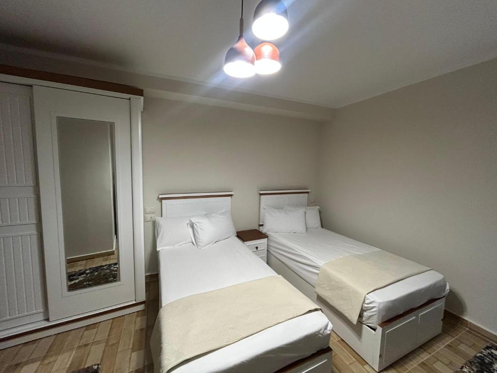 Postel nebo postele na pokoji v ubytování Stayline hotel apartments 5 mins from Cairo airport