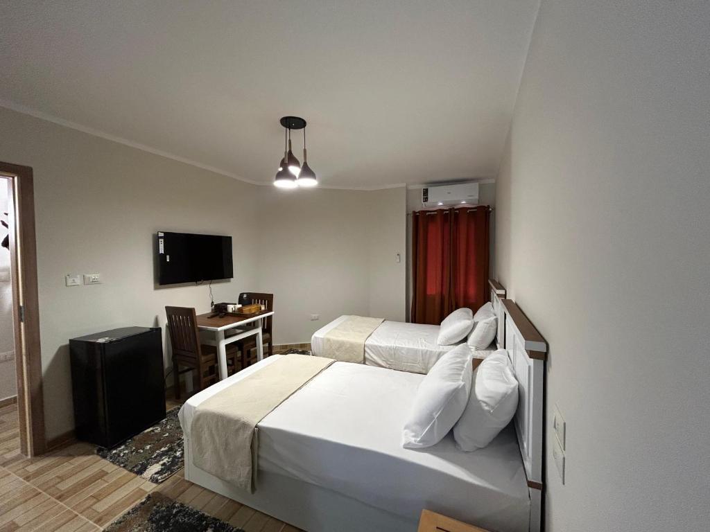 Postel nebo postele na pokoji v ubytování Stayline hotel apartments 5 mins from Cairo airport