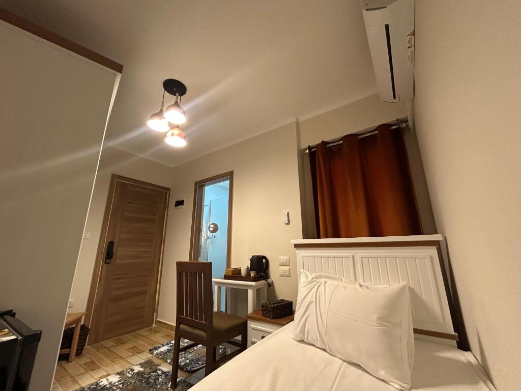 Postel nebo postele na pokoji v ubytování Stayline hotel apartments 5 mins from Cairo airport