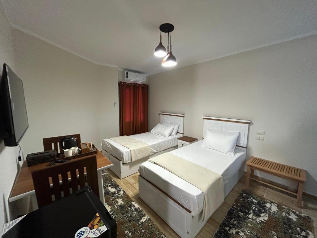 Postel nebo postele na pokoji v ubytování Stayline hotel apartments 5 mins from Cairo airport