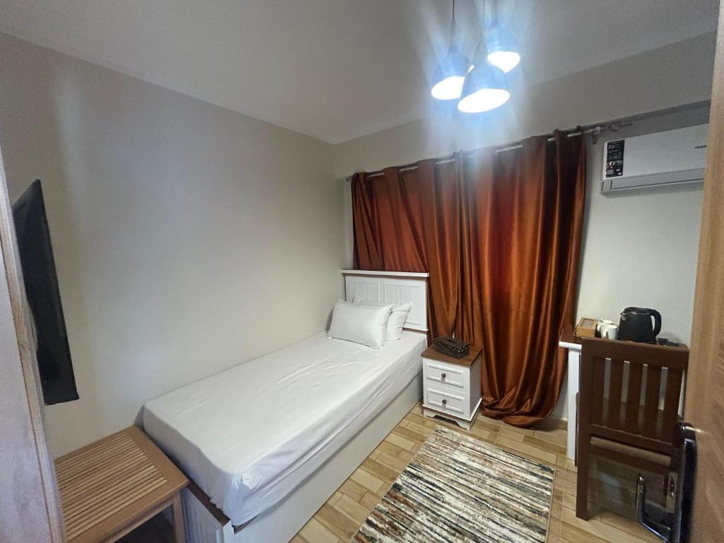 Postel nebo postele na pokoji v ubytování Stayline hotel apartments 5 mins from Cairo airport