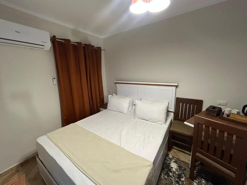 Postel nebo postele na pokoji v ubytování Stayline hotel apartments 5 mins from Cairo airport