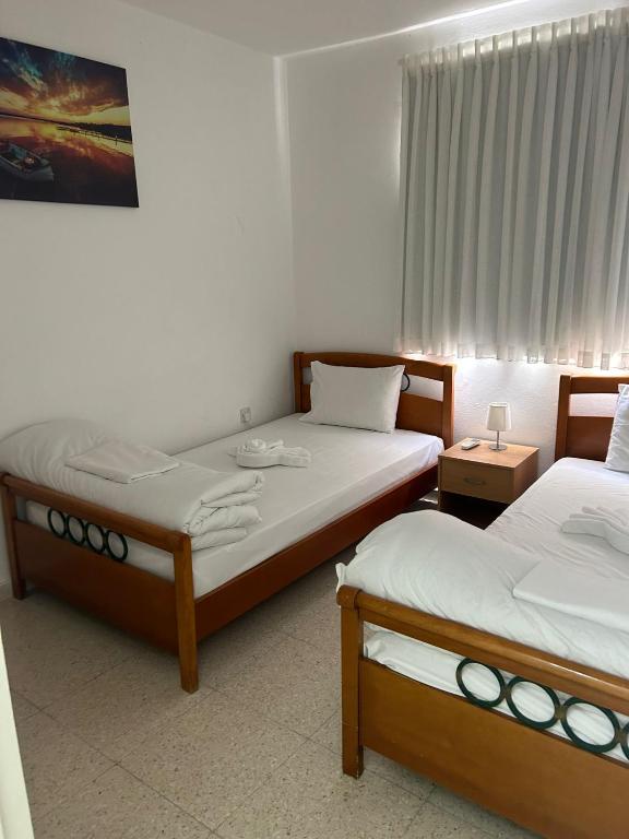 Postel nebo postele na pokoji v ubytování Mersey Faros Complex