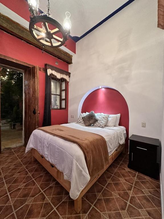 Postel nebo postele na pokoji v ubytování Copa de Oro Hotel Boutique