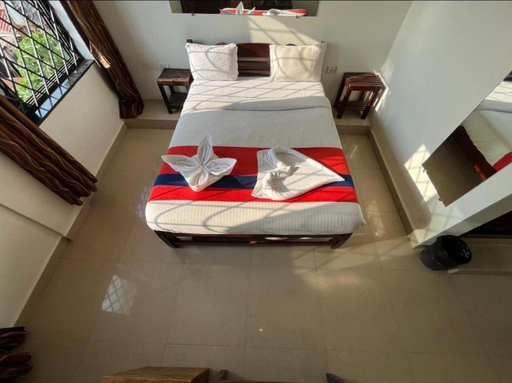 Postel nebo postele na pokoji v ubytování Mehar Rooms