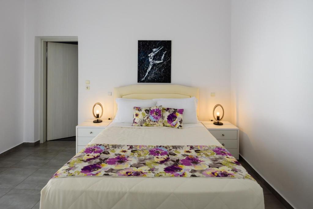 Postel nebo postele na pokoji v ubytování Aigli Villa