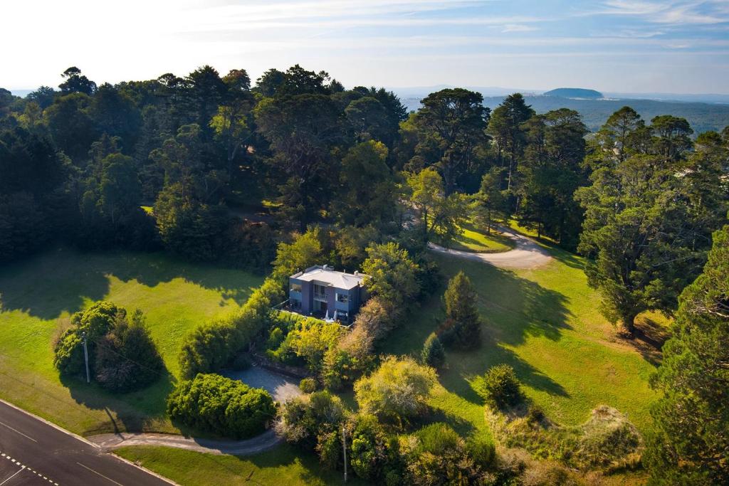 an aerial view of a house in the middle of a field at Daybreaker Daylesford in Daylesford
