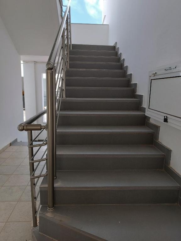 a set of stairs in a building at Georgia Hotel Apartments in Protaras
