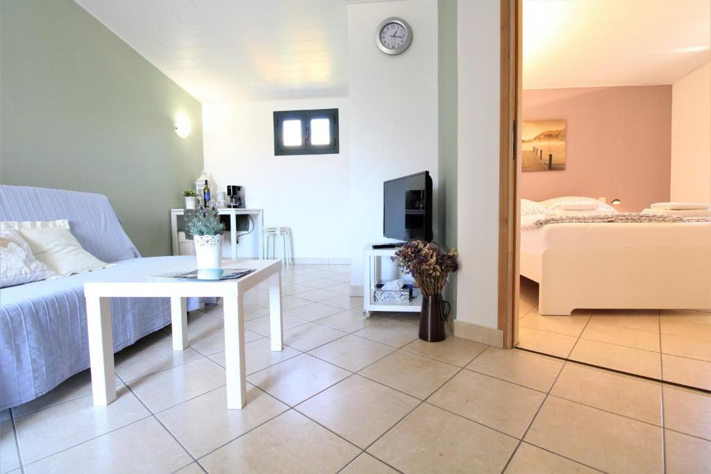 Ένα ή περισσότερα κρεβάτια σε δωμάτιο στο Apartments Frideric