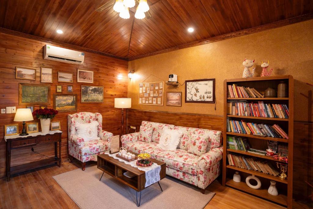 Χώρος καθιστικού στο Em mơ Homestay